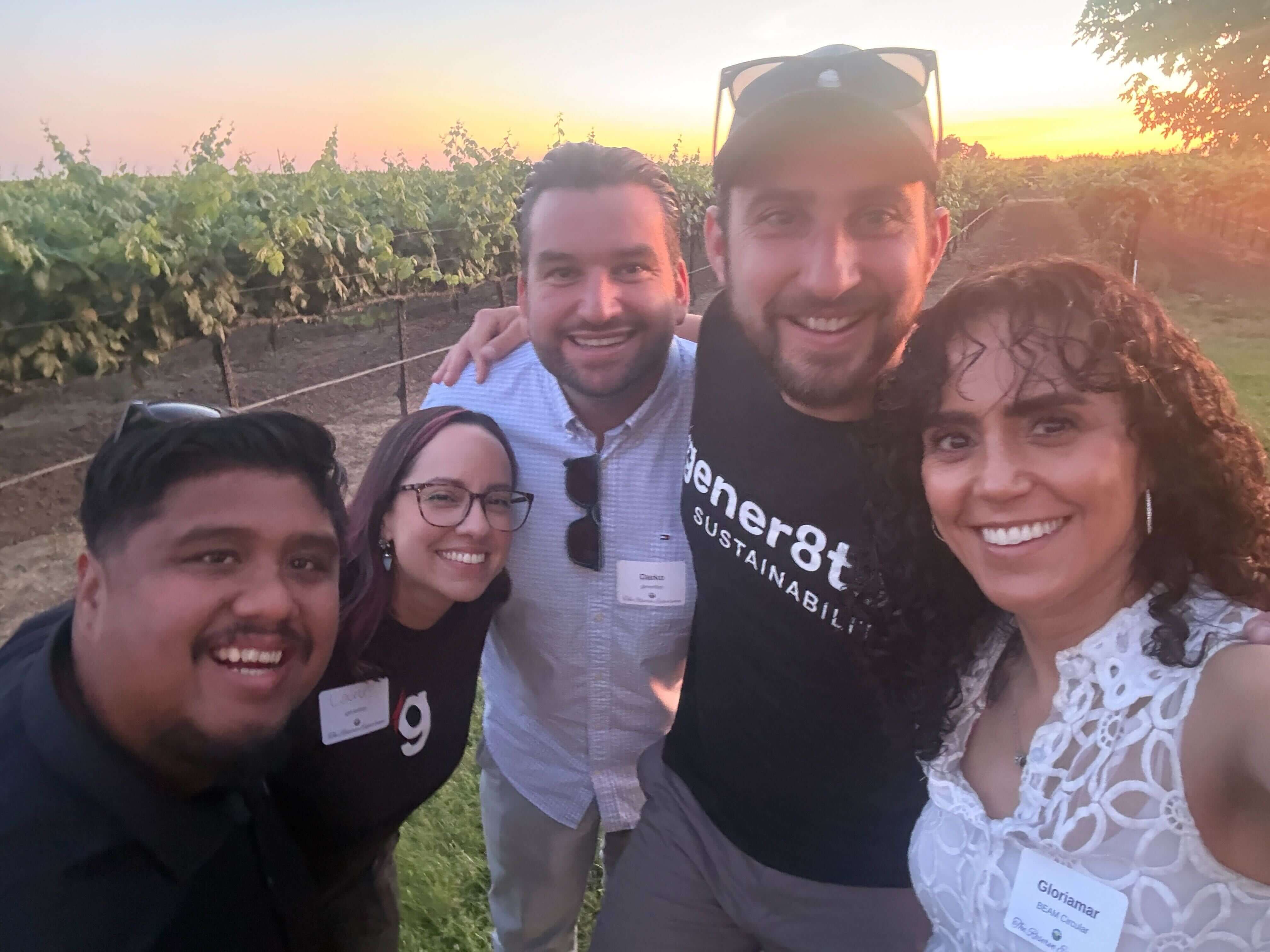 gener8tor sustainability team members smiling together in a field