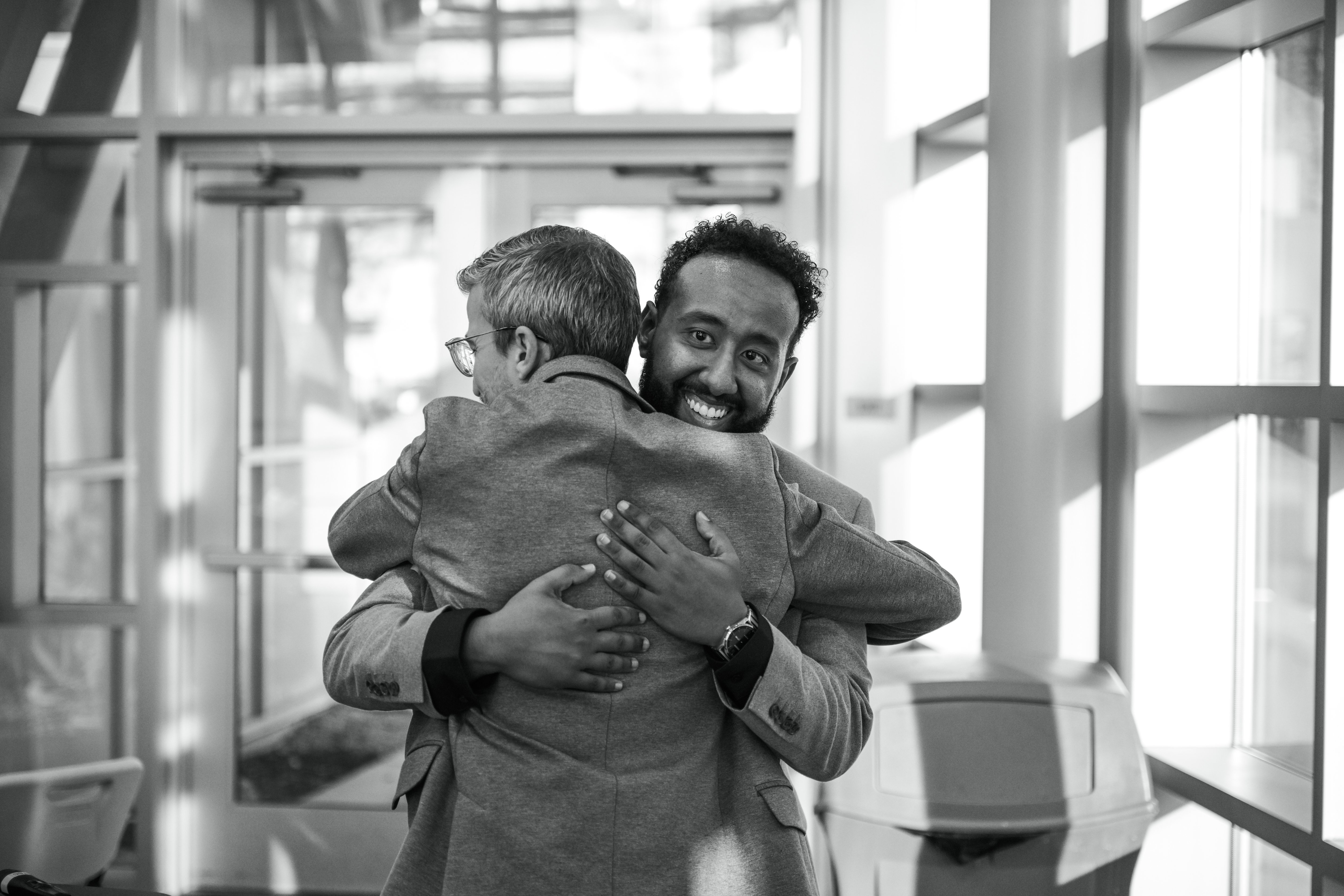 gener8tor Staff Hug in Office