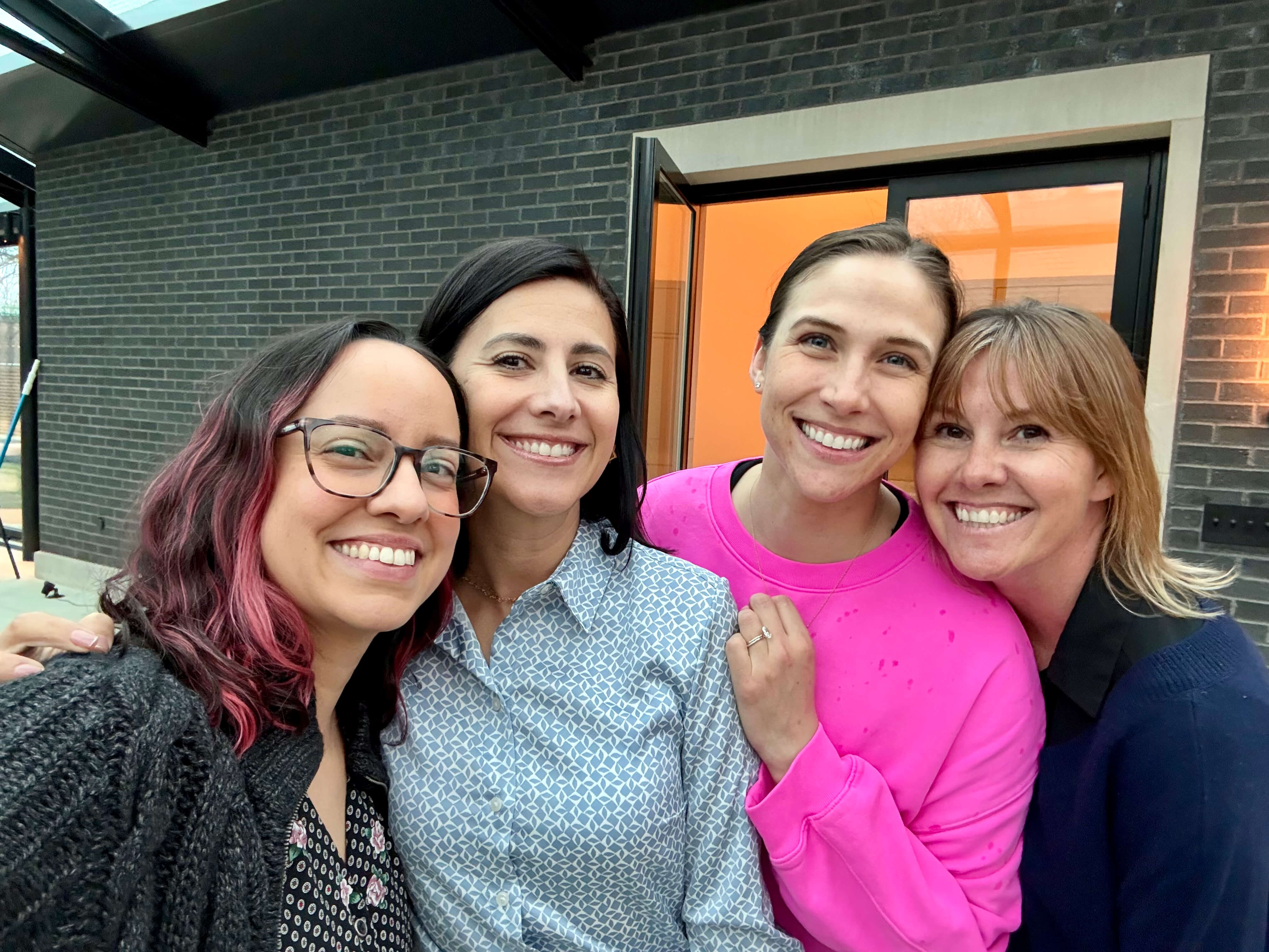 gener8tor team members smiling for a group selfie