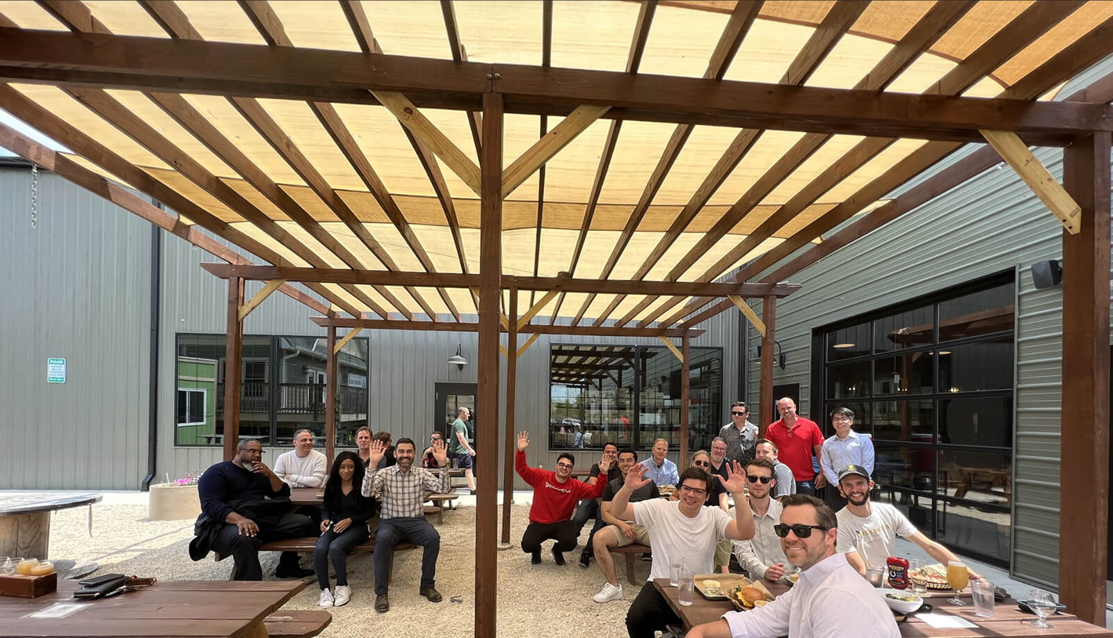 Startup founders and gener8tor team members at an outdoor accelerator community event