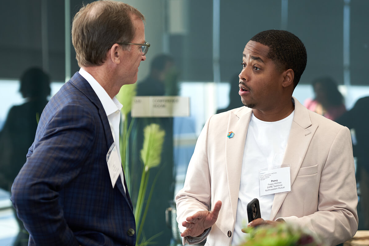 Two founders talk at a gener8tor Wisconsin event